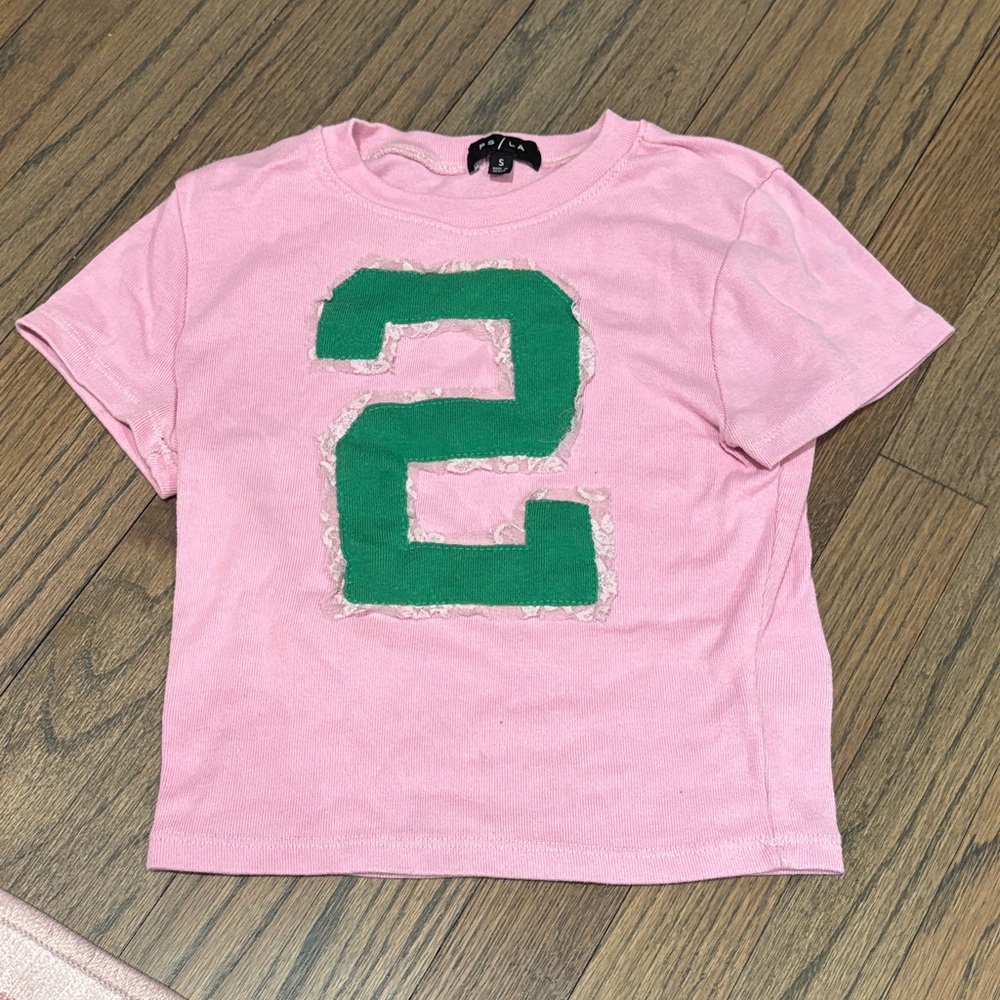 Pink Kids Shirt with Green Number by [Brand]